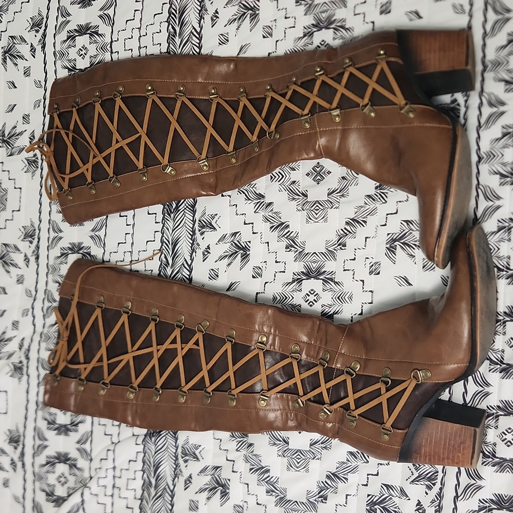 Tall riding boots, fake leather zip up.
